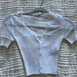 White blouse sheer top
